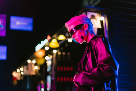 Vibrant cyberpunk style portrait of a woman in sunglasses with neon lights.