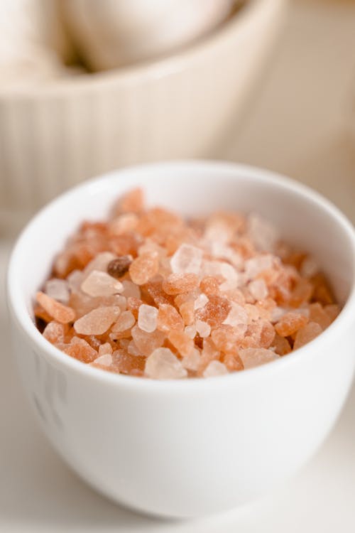 Salt Stones in White Ceramic Bowl