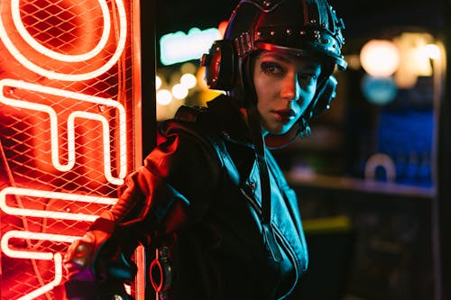 Woman Wearing Black Jacket and Helmet