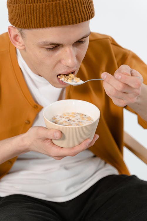 Free Man Eating Cereals Stock Photo