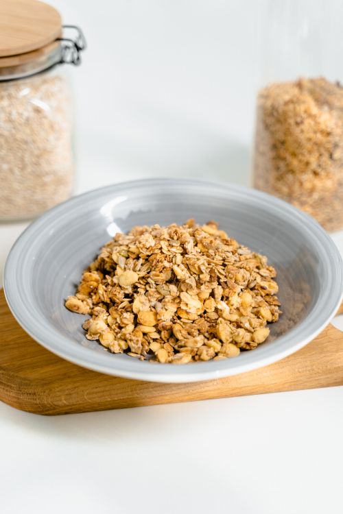 Free Close-up of crunchy granola in a bowl, perfect for a nutritious breakfast. Stock Photo