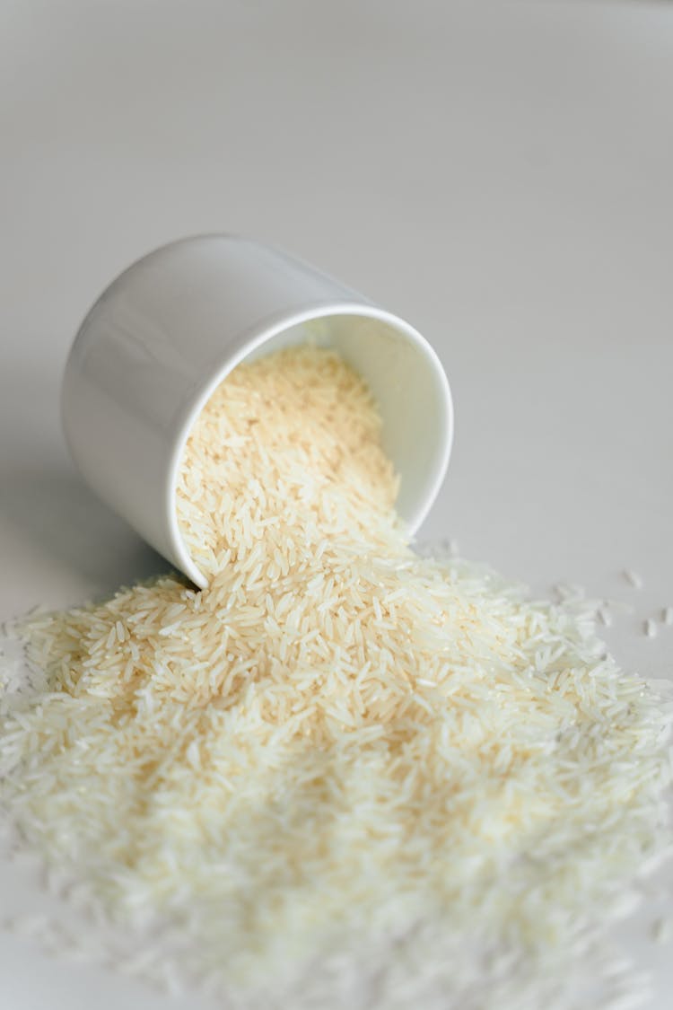 White Rice In White Ceramic Cup