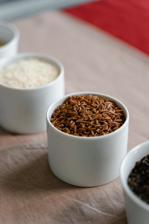 Free White Ceramic Cups With Rice Varieties Stock Photo