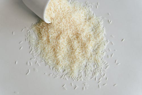 Uncooked Rice on White Surface