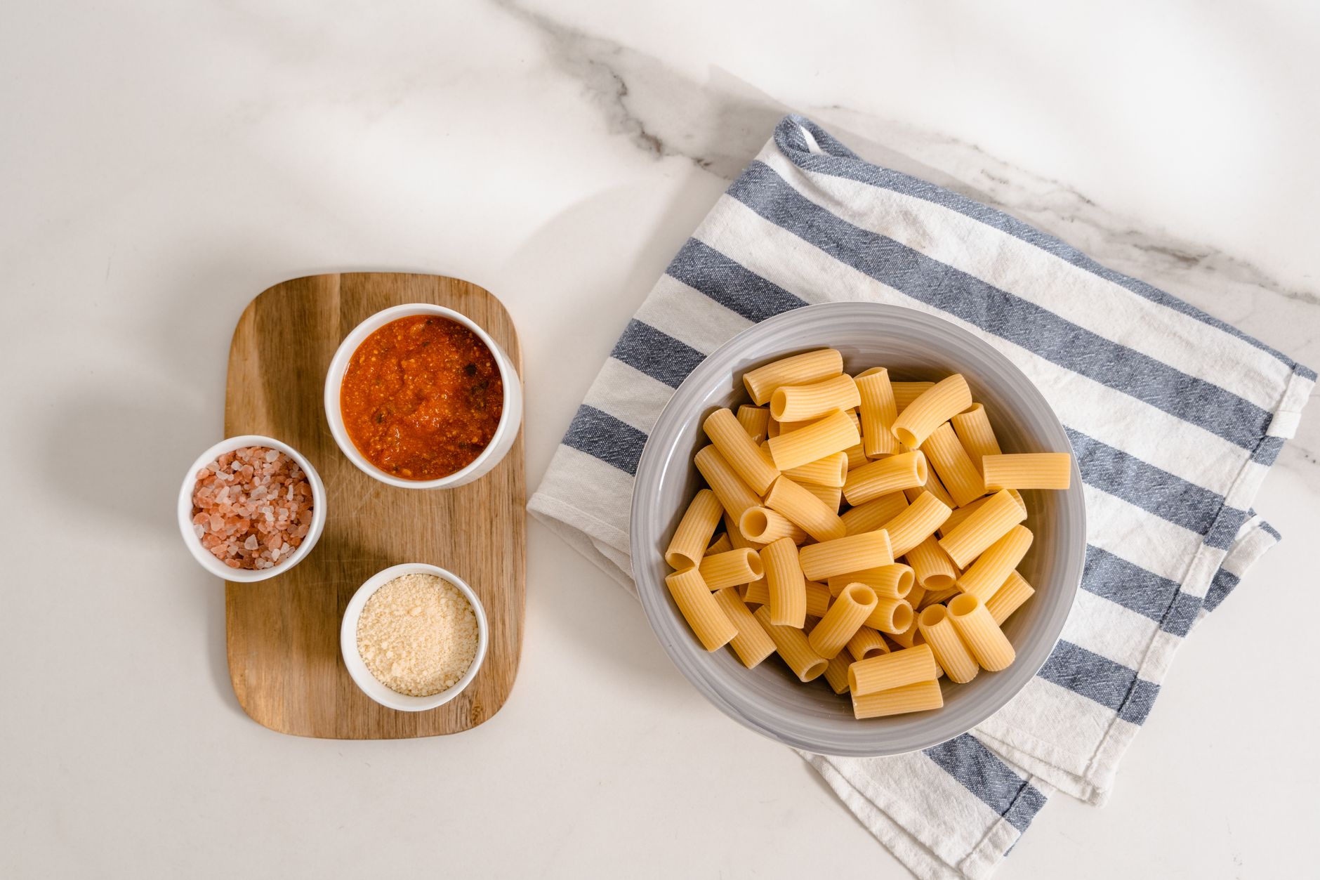 rigatoni and cheese topped with parmesan and truffle shavings