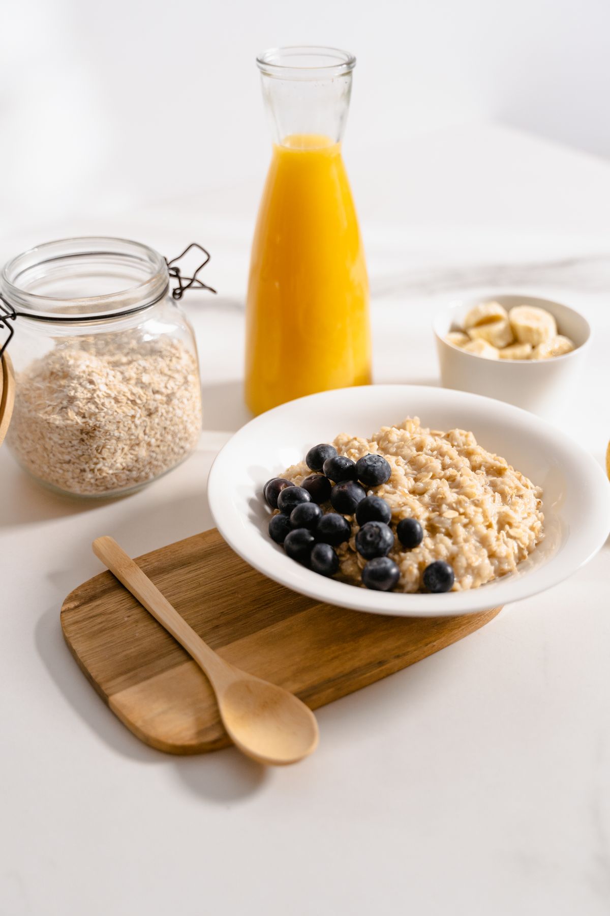 Healthy breakfast with oatmeal, fruit, and juice