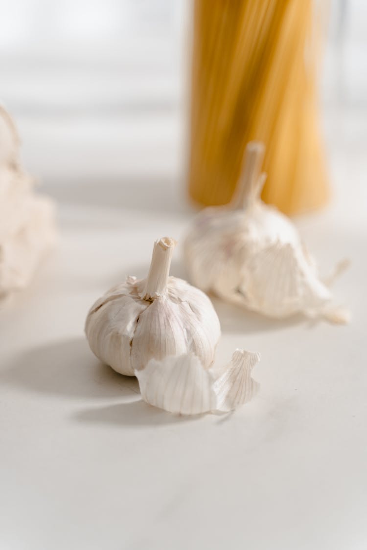 A Garlic Bulb On White Table