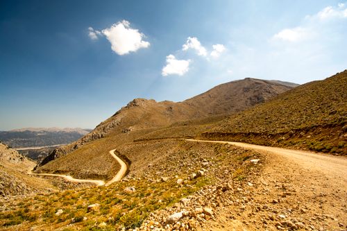Free Scenic mountain landscape with a winding road in Gömbe, Antalya, Türkiye under a clear sky. Stock Photo