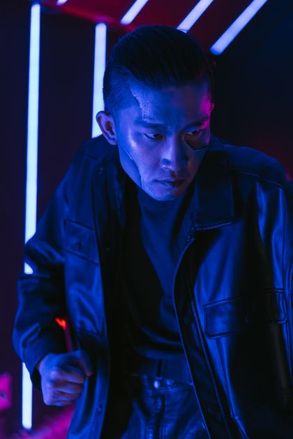 Neon-lit futuristic portrait by Mikhail Nilov on Pexels