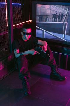 Futuristic cyberpunk fashion scene with neon lights and edgy style.
