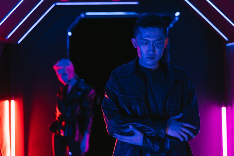 Men In A Neon Tunnel