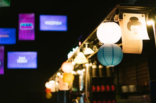 Paper Lanterns and String Light Bulbs Hanging