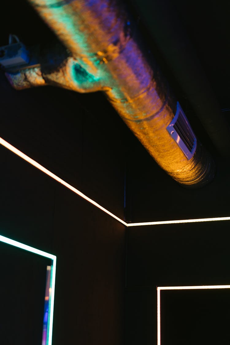 Strip Lights Under A Ceiling Pipe