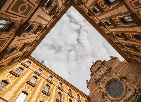 Stunning low angle view of Montserrat Abbey's architecture and ornate facade.