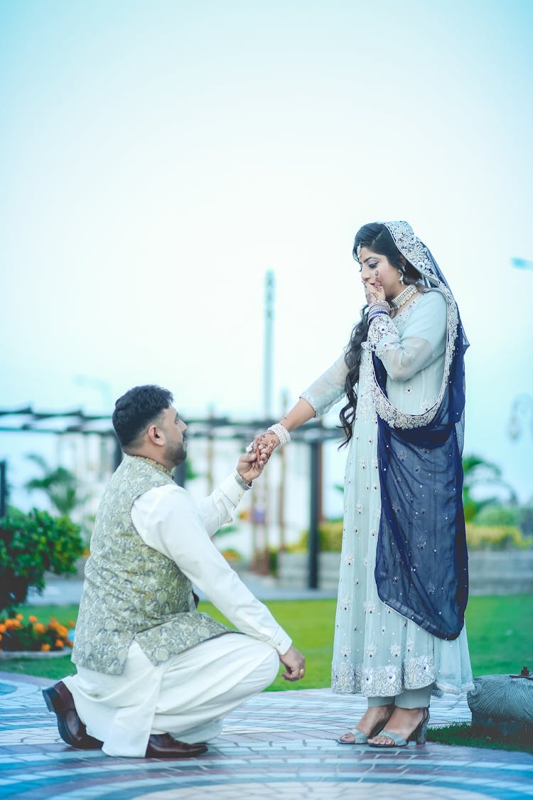 Man Making A Marriage Proposal To A Surprised Woman