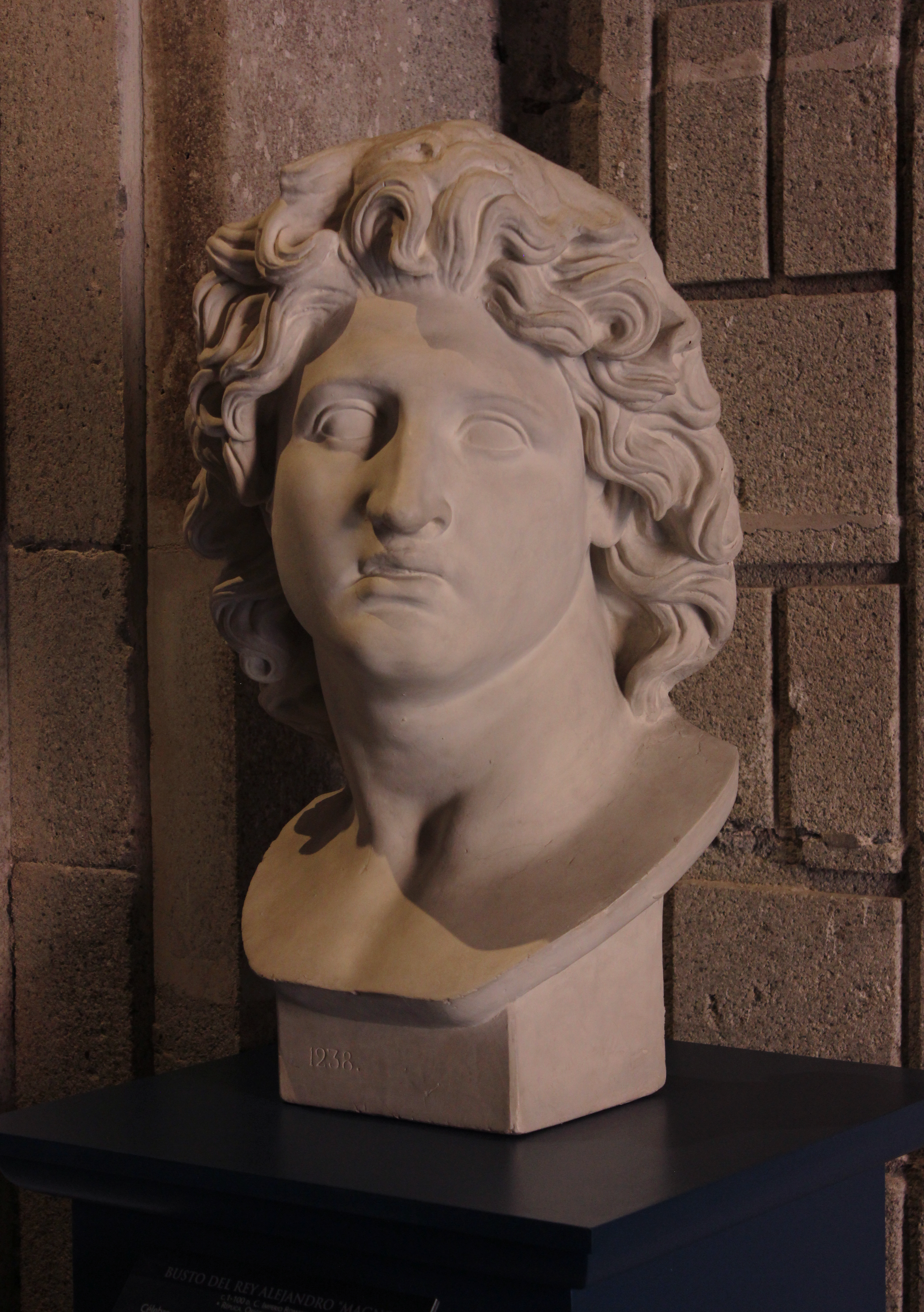 Elegant marble bust sculpture displayed in a museum, Mexico City.