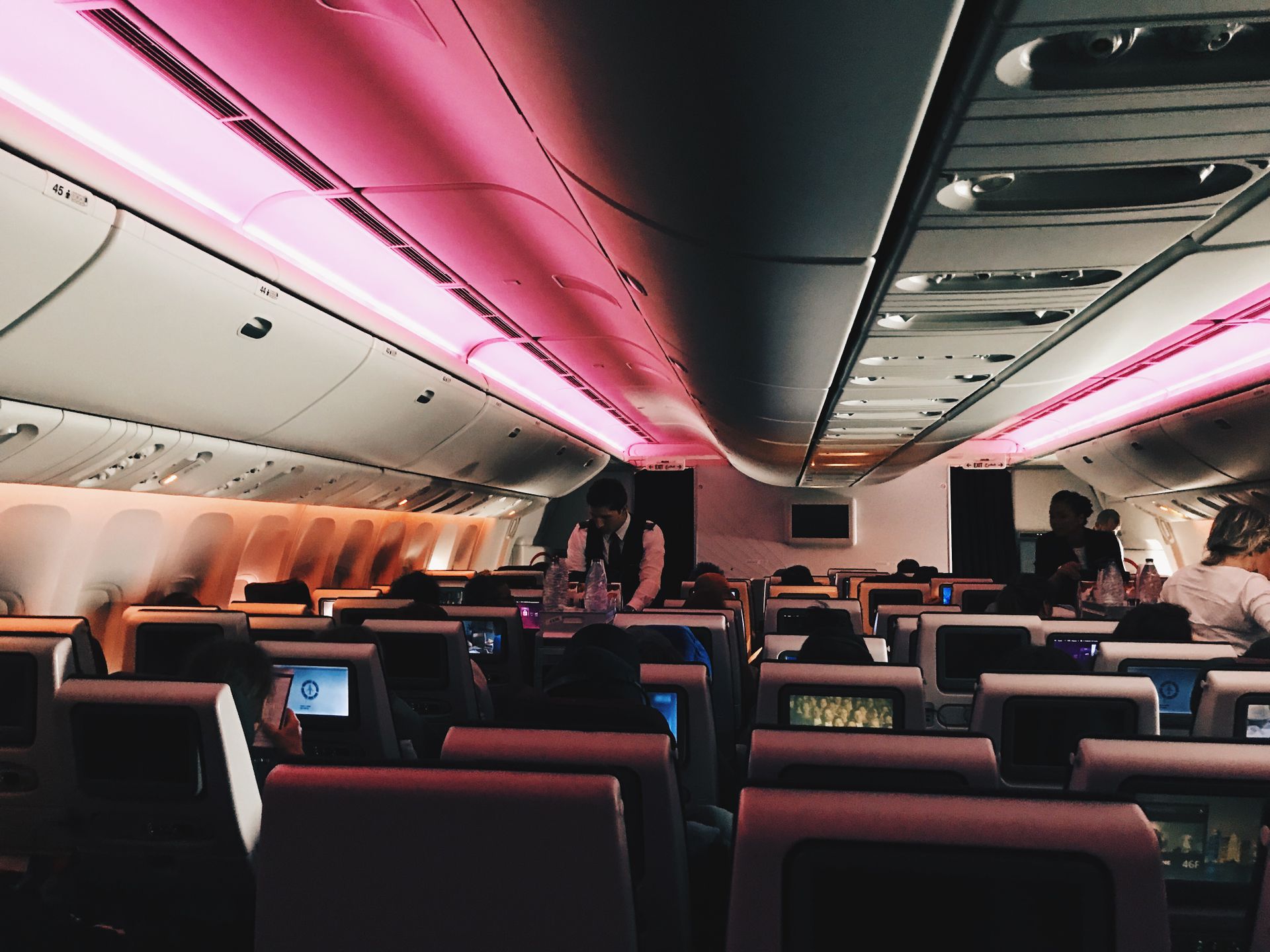 Airplane Interior with Passengers on their Seats