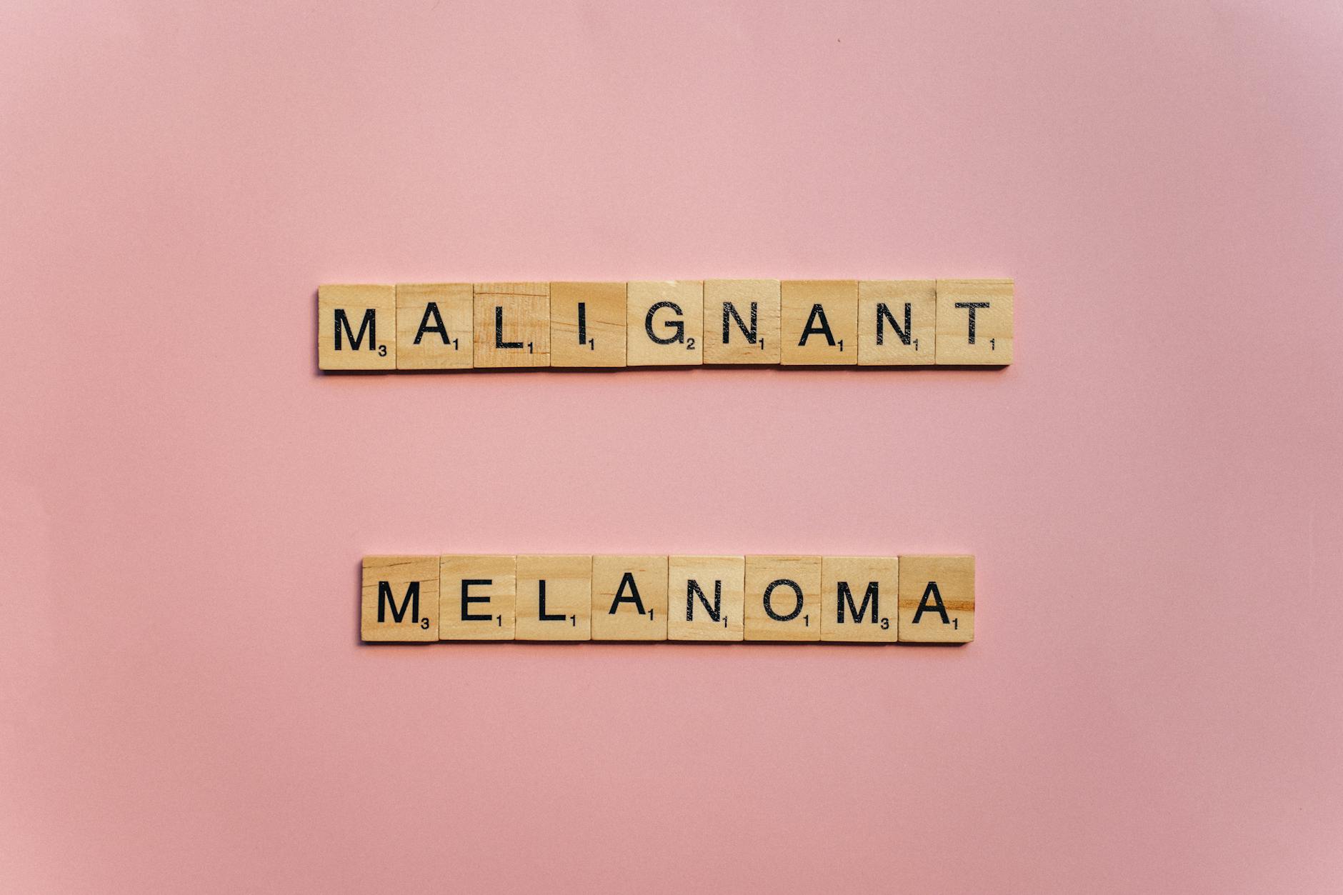 Malignant Melanoma on Wooden Scrabble Pieces