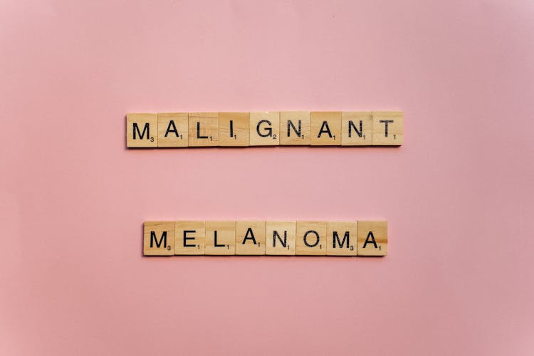 Malignant Melanoma On Wooden Scrabble Pieces