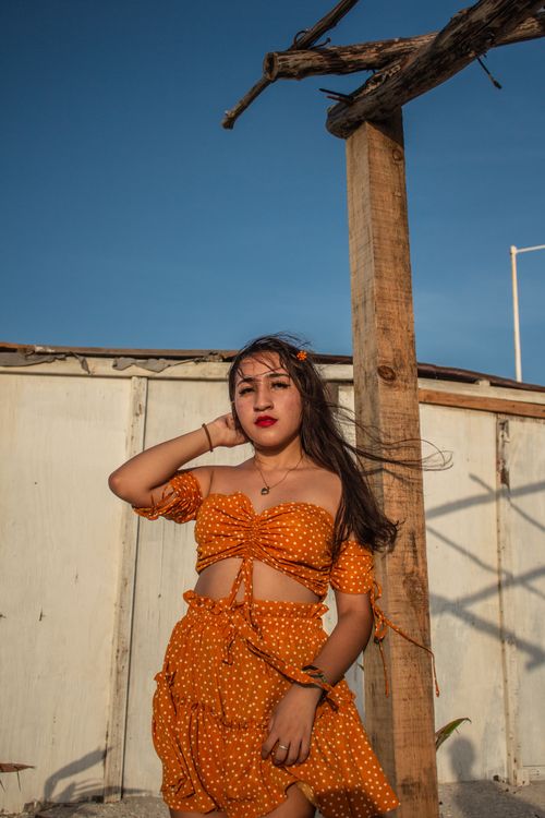 Woman in Orange and White Polka Dot Dress Free Stock Photo Woman in Orange and White Polka Dot Dress Free Stock Photo