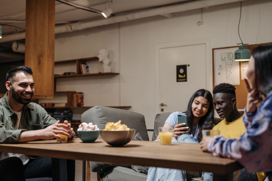 Friends sitting around a workshop table — photo by Pavel Danilyuk on Pexels