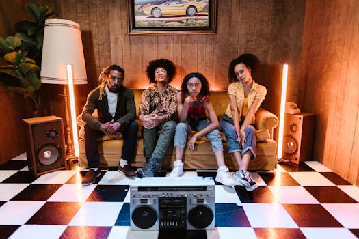 Four stylish individuals sitting in a retro-themed room with checkered floor and vintage decor.