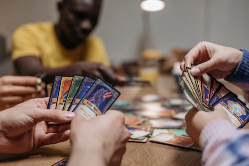 People Playing Card Games