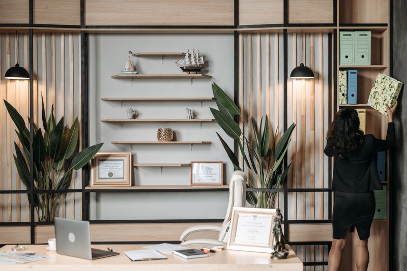 woven fabric storage bins on an office shelf