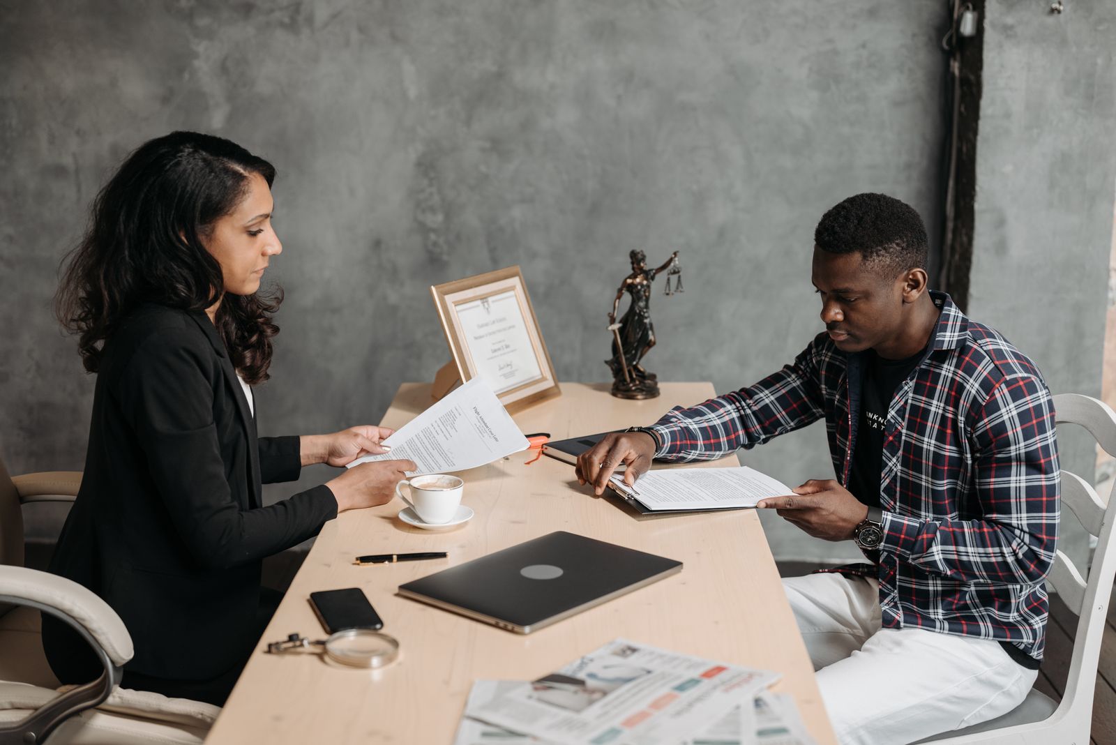 Business owners reviewing documents together in an office