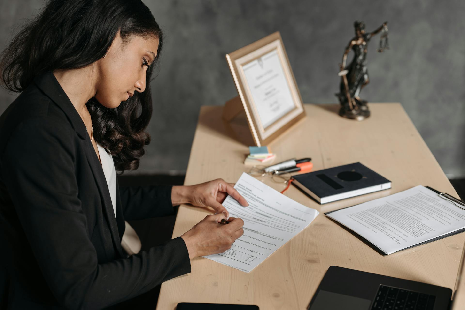 Female Lawyer looking at Documents