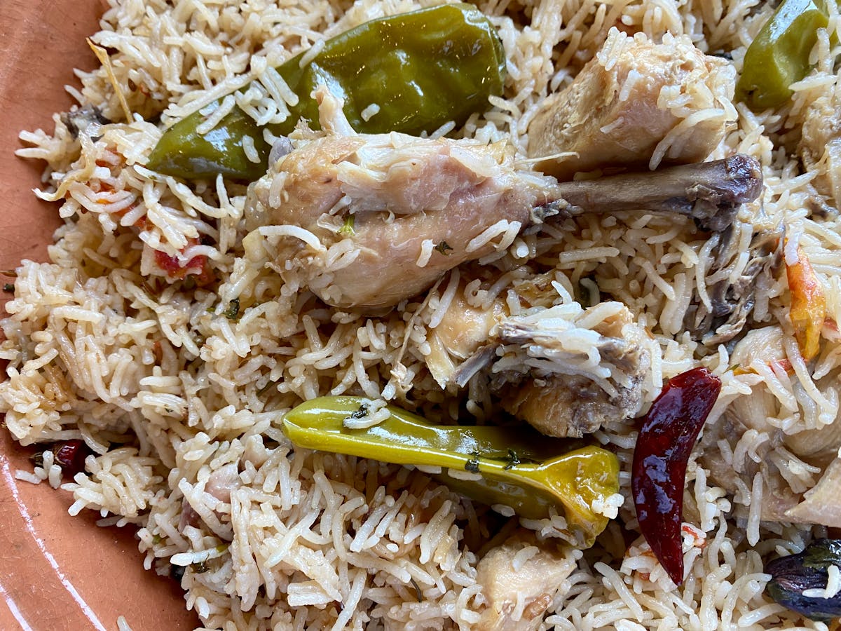 Family member video calling a patient in the hospital using a tablet