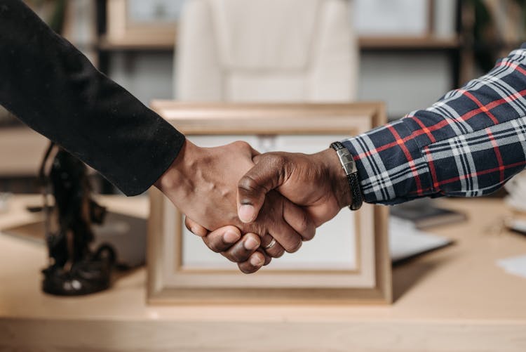 Close-up Shot Of A Handshake