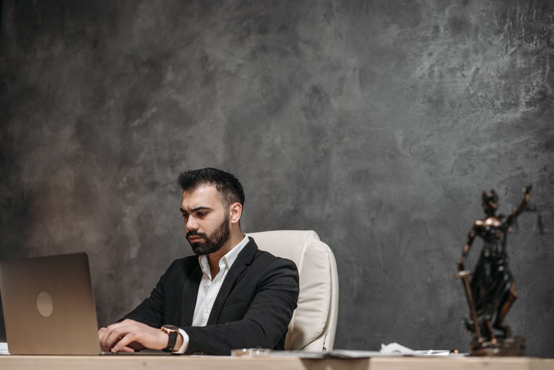 lawyer reviewing legal documents in professional office