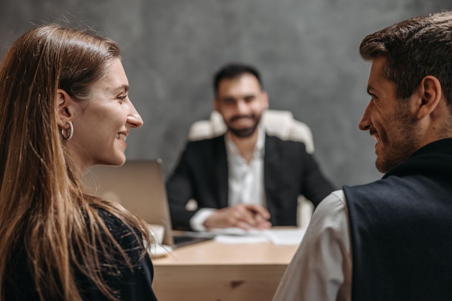Clients consulting with an attorney at a law office