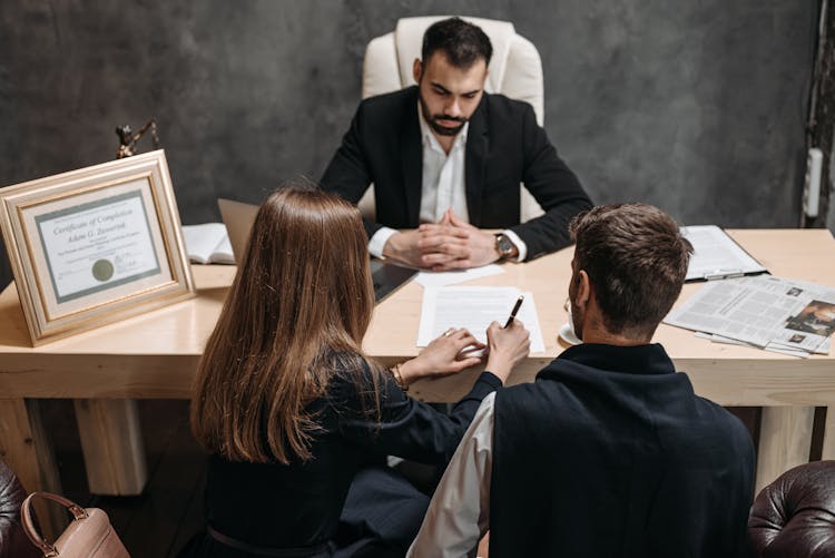 Clients At Lawyers Office 