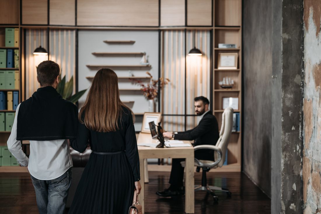 Professional couple entering a consultation