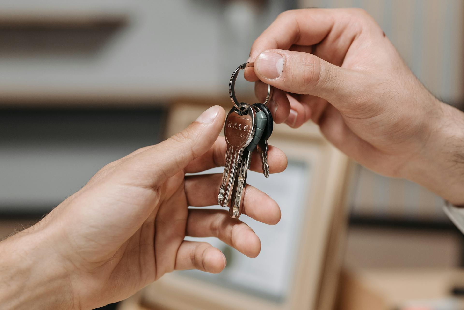 A Close-up Shot of a Person Holding Keys