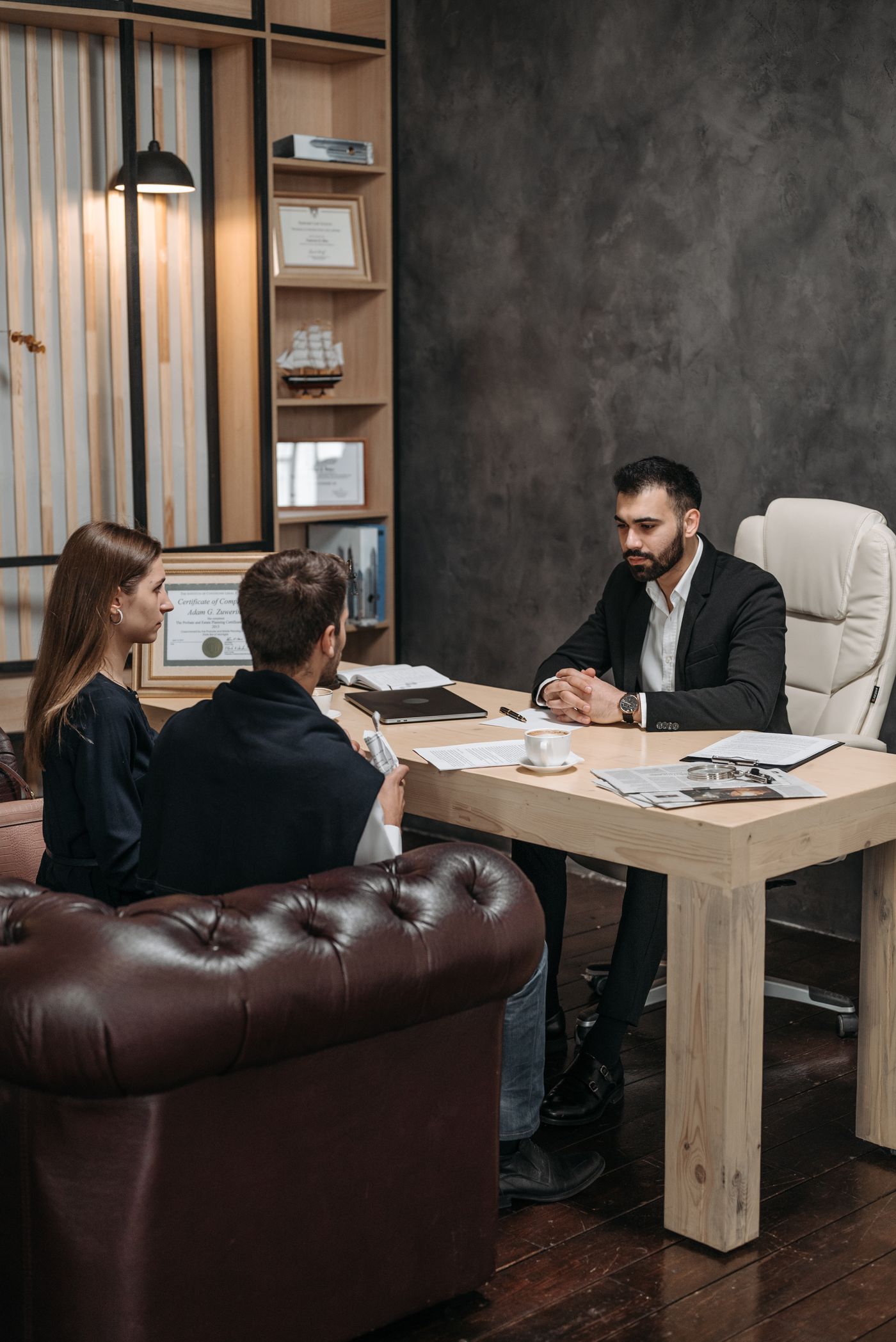 Long meeting table prepared for a closed partner session