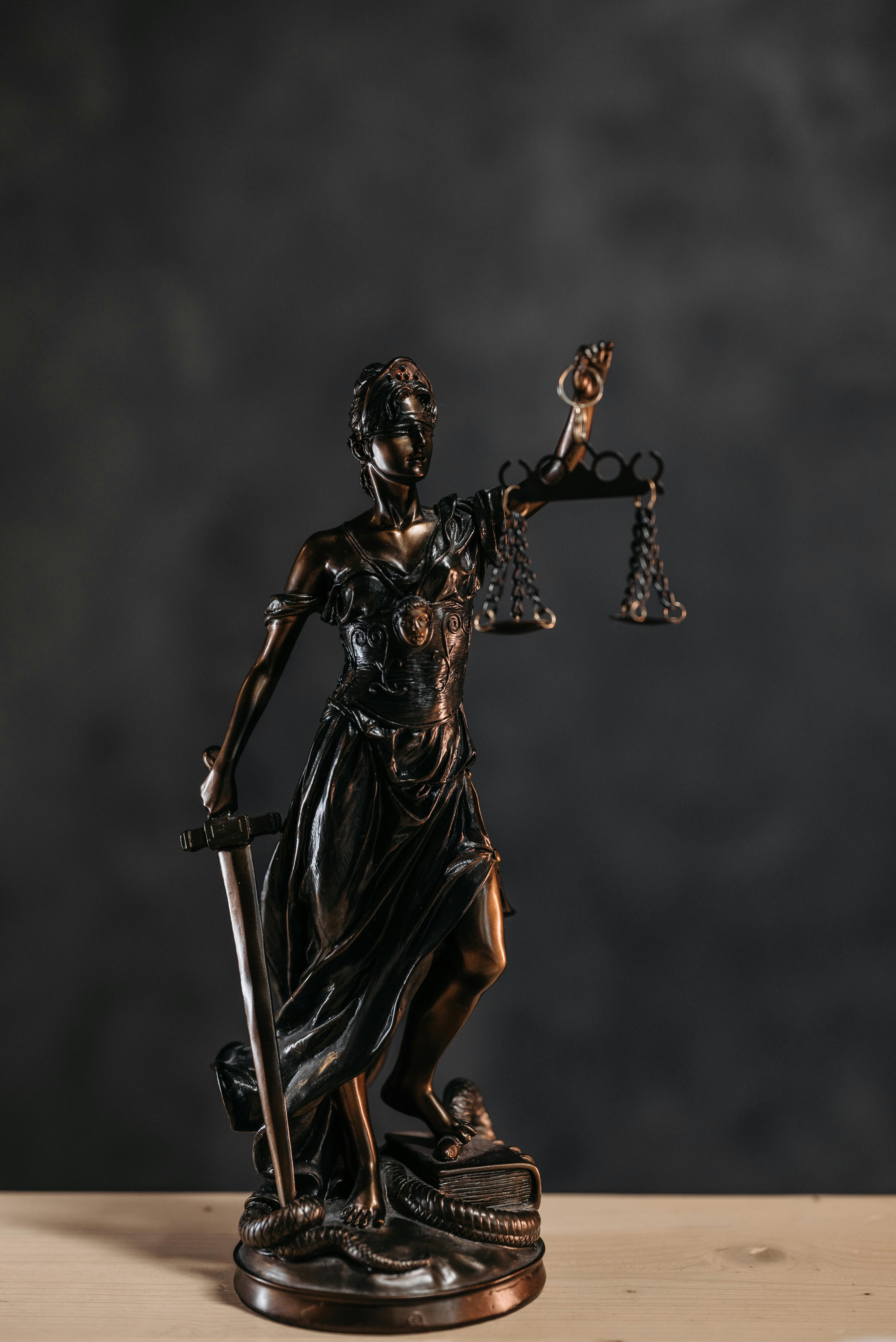 close up photo of a lady justice statuette