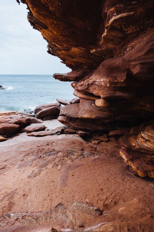 Free Explore stunning coastal rock formations with ocean views, showcasing nature's artistry. Stock Photo