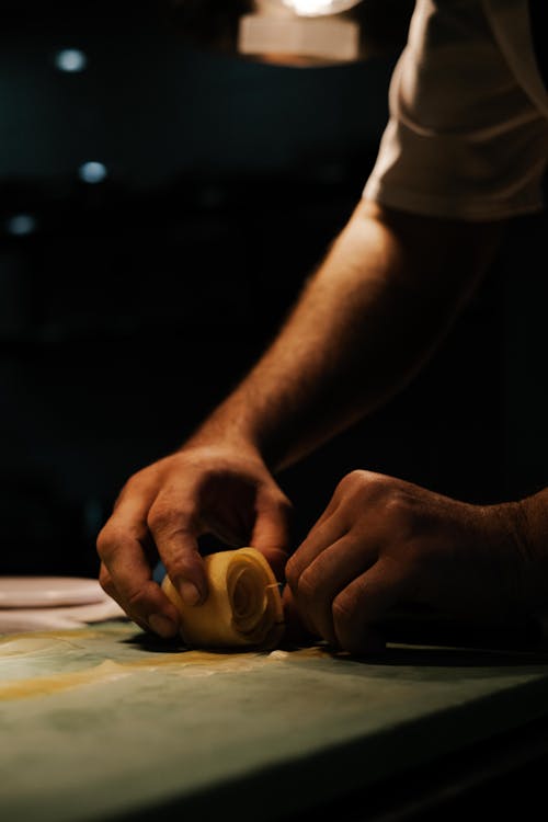 Close-up of a Man Crafting a Product 