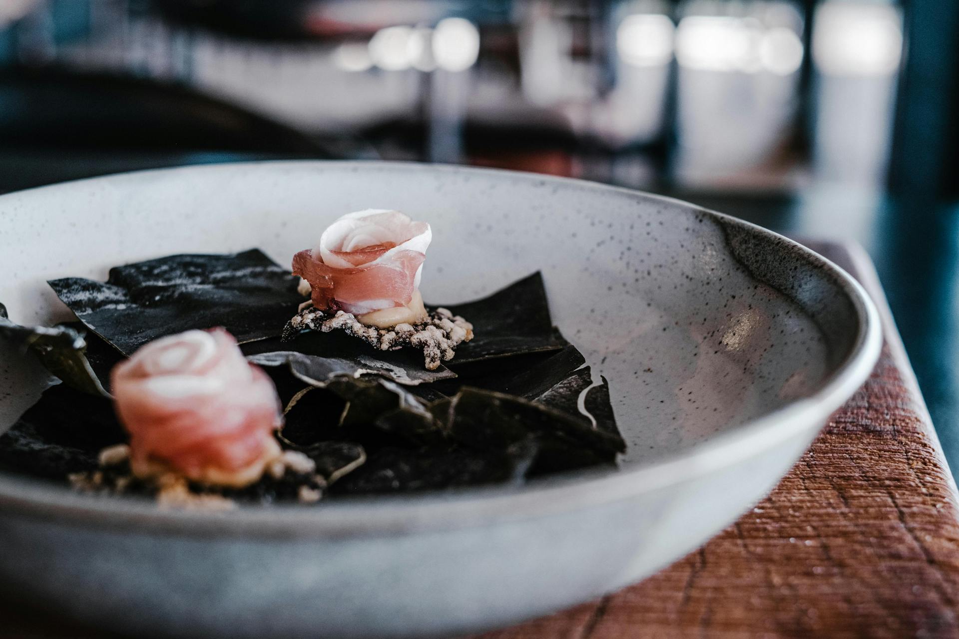 Edible Seaweed with Raw Meat on Ceramic Bowl