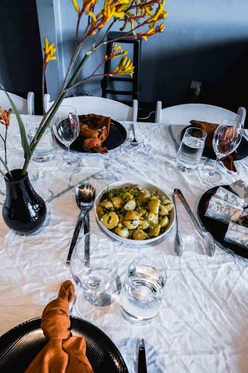 Table Setting and a Bowl of Potato Wedges