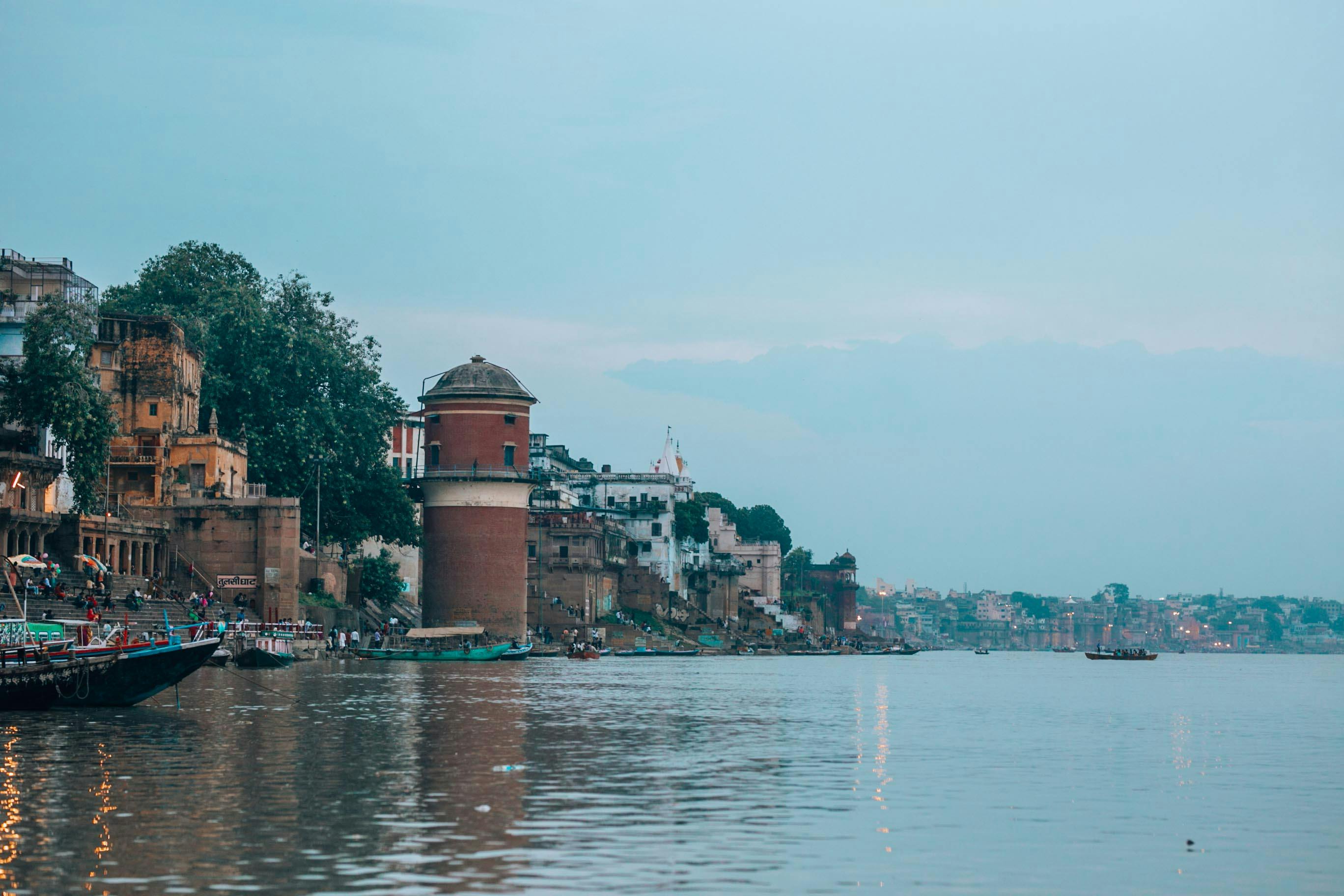 Red water tower on the Ganges riverbank, Varanasi, Uttar Pradesh, India Stock Photo - Alamy