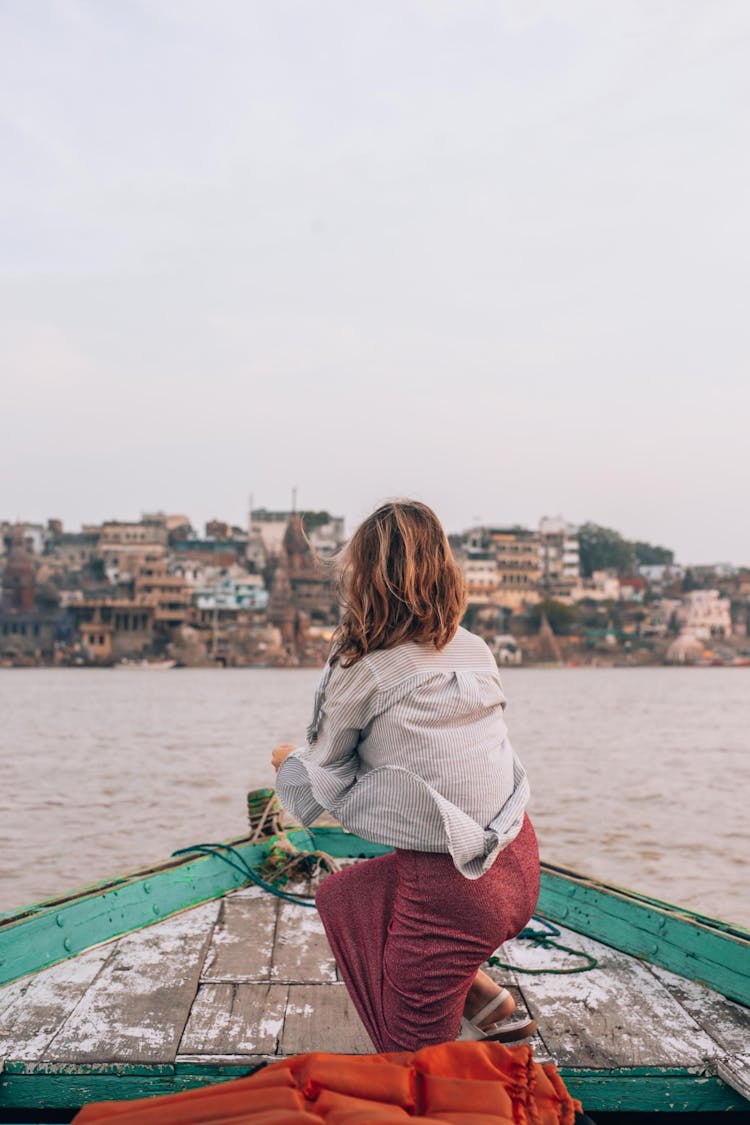 Back View Of A Woman On A Boat 