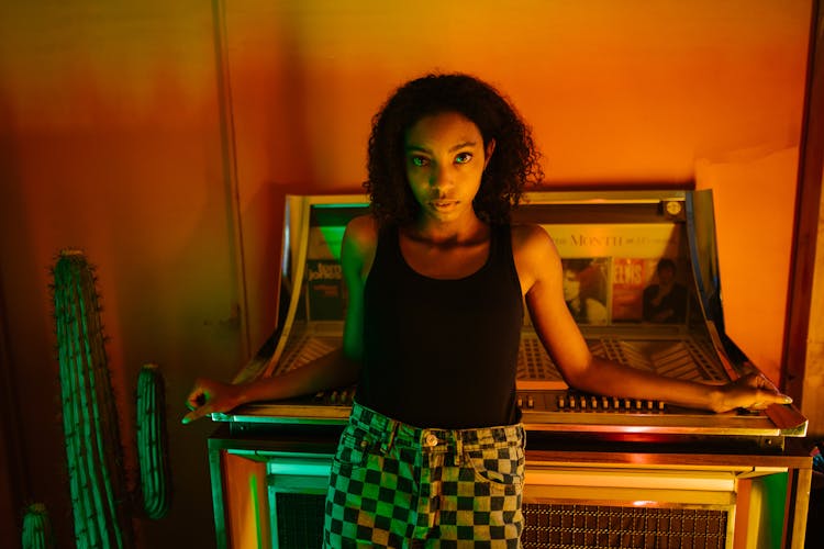 Woman Leaning On A Jukebox