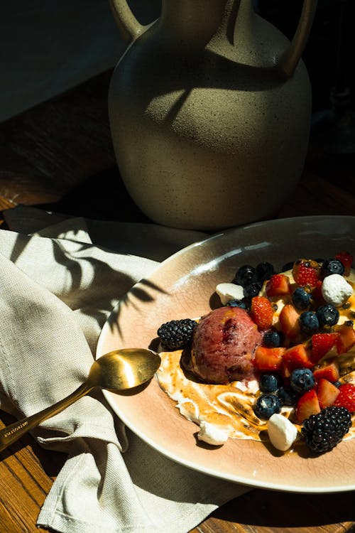 Close-up of a Dessert with Fruit and Ice Cream