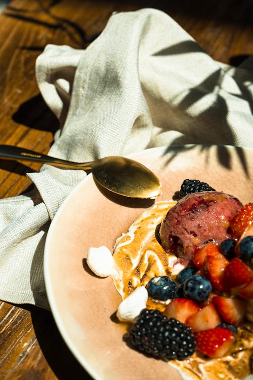 Close-up of a Dessert with Fruit and Ice Cream 