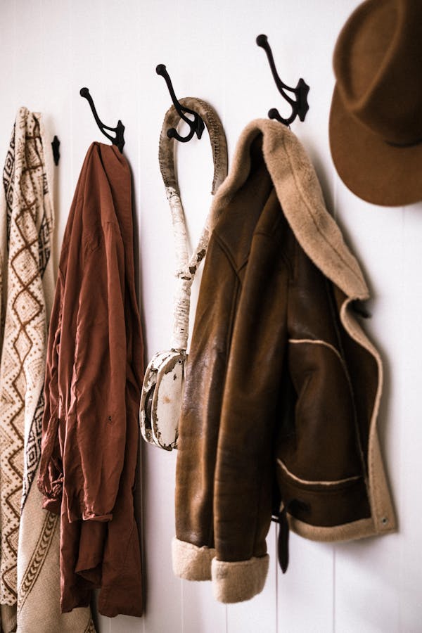 Clothes on Hooks on Wall
