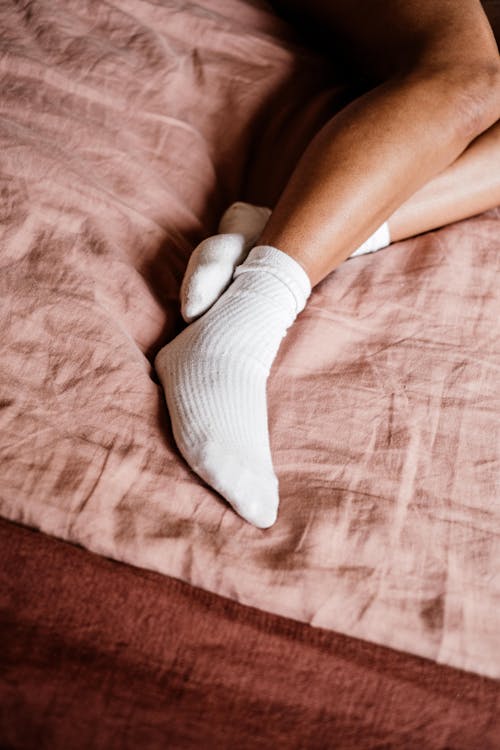 Free Photograph of a Person Wearing White Socks Stock Photo